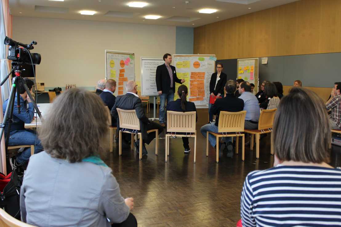 Enlarged view: Students watching a group discussion